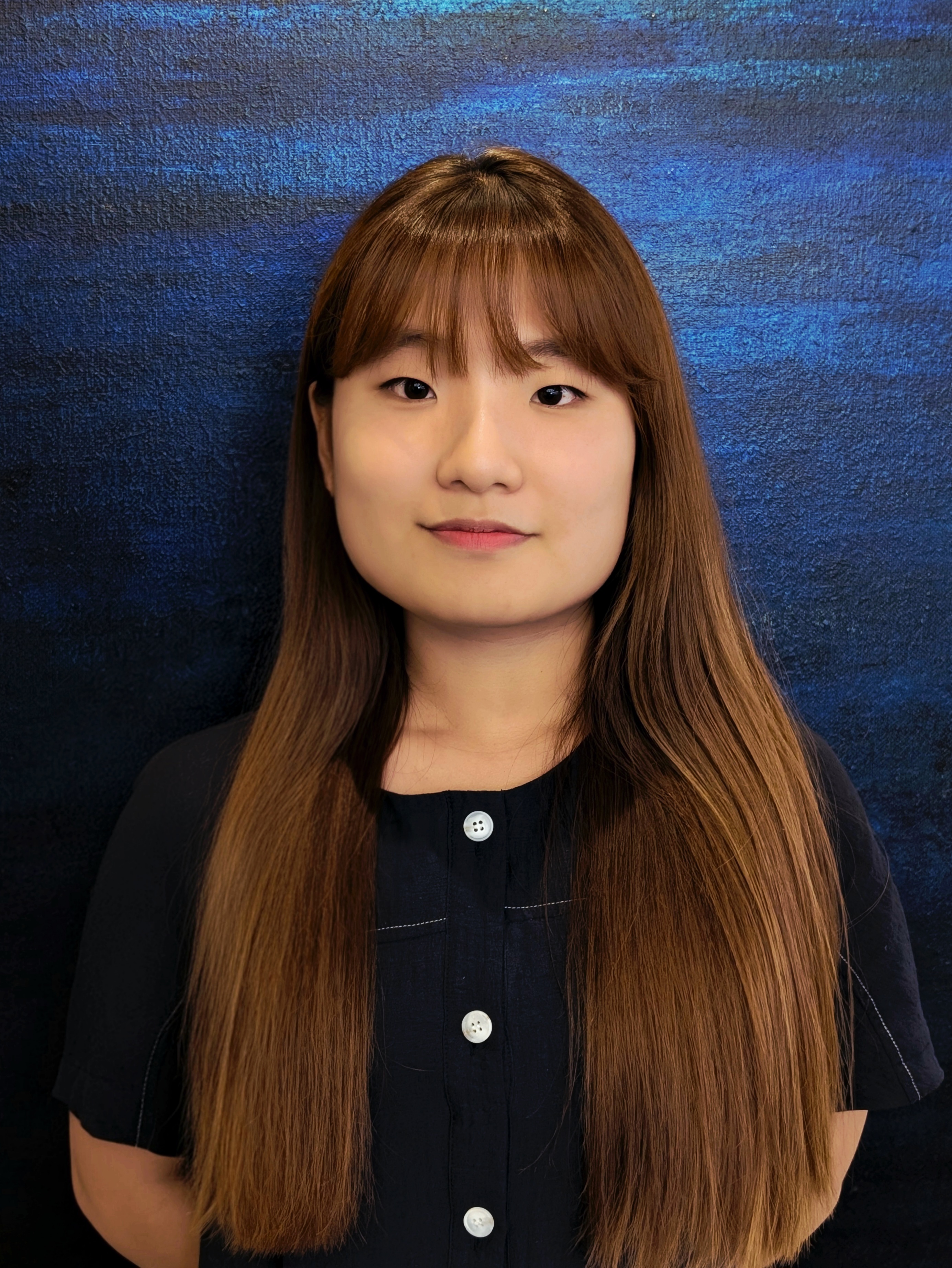 A person with long hair.