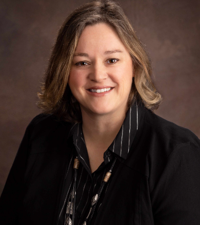 A person smiling for the camera.