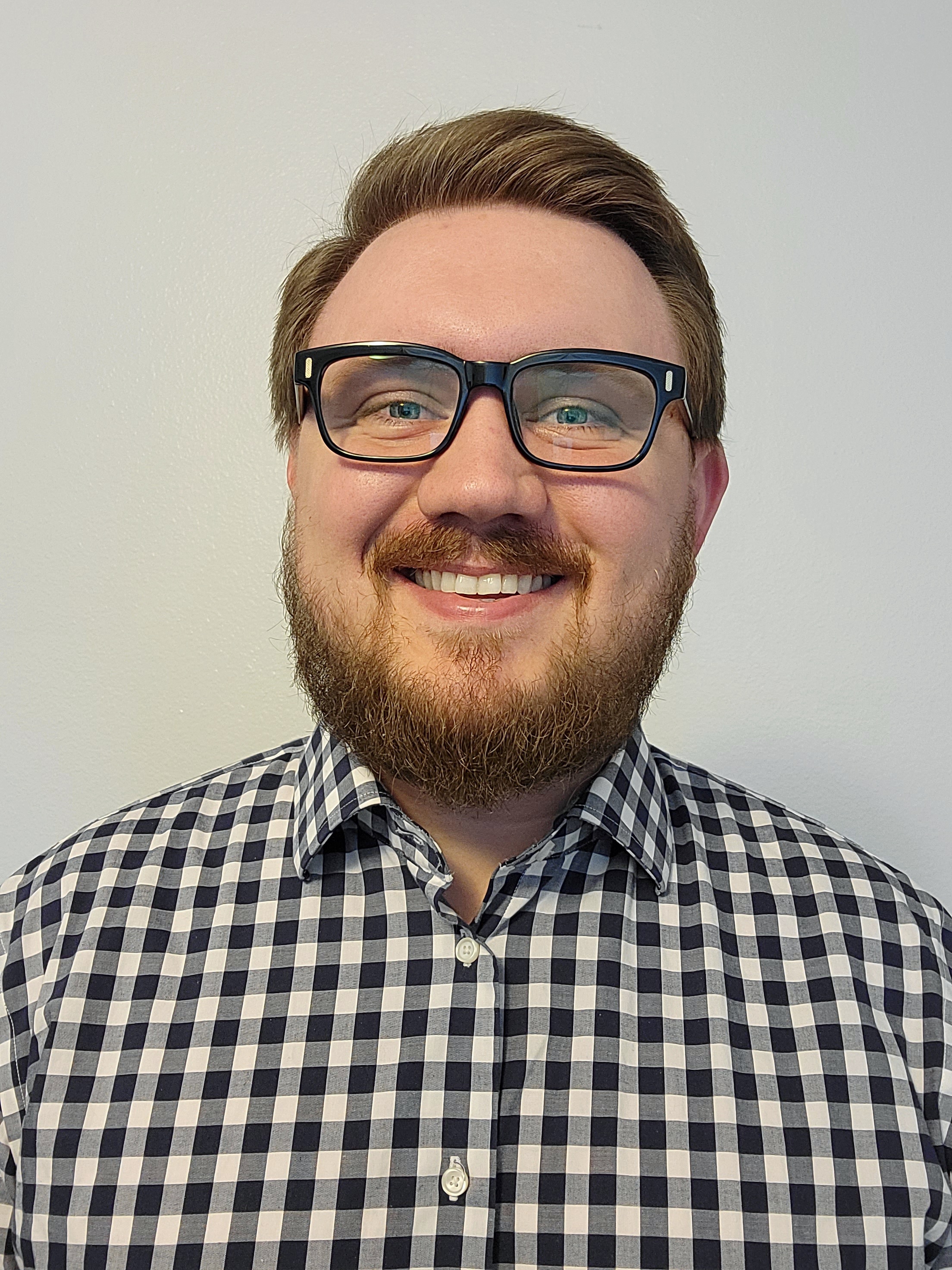 A man wearing glasses.