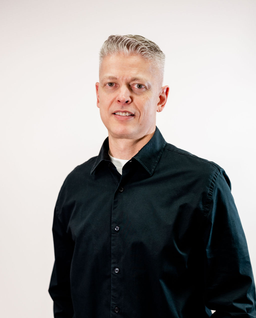 A man wearing a black jacket.