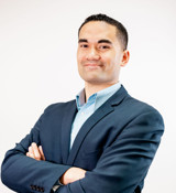 A man folding his arms.