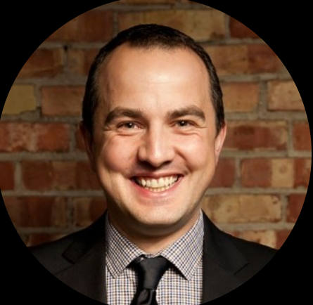 A man smiling for the camera.