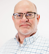 A man wearing glasses.