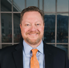 A man in a suit and tie.