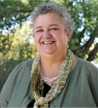 A person smiling for the camera.