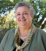 A person smiling for the camera.