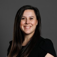 A person smiling for the camera.