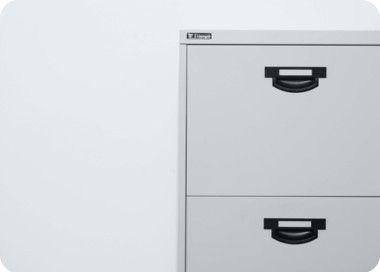 A white rectangular object with a black handle.