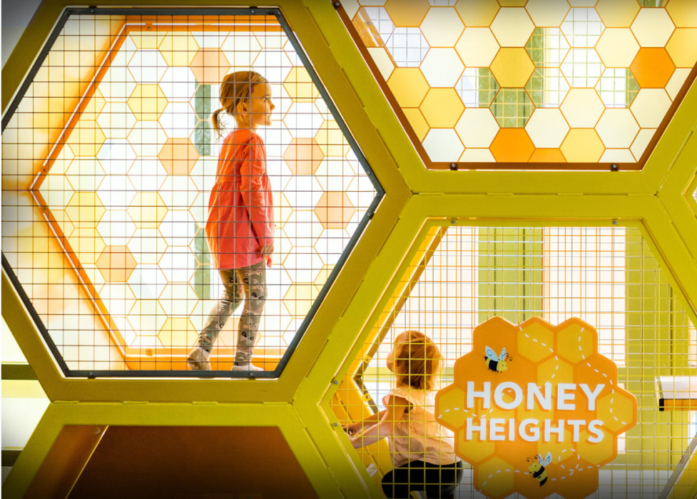 A  child in a exhibit in Discovery Gateway.