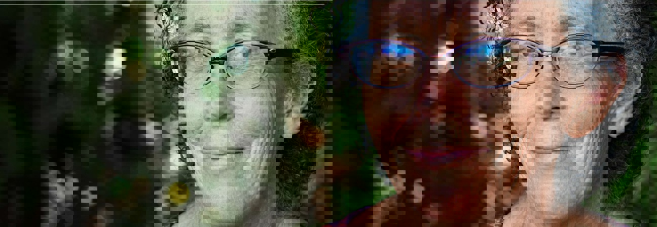 A person wearing glasses.