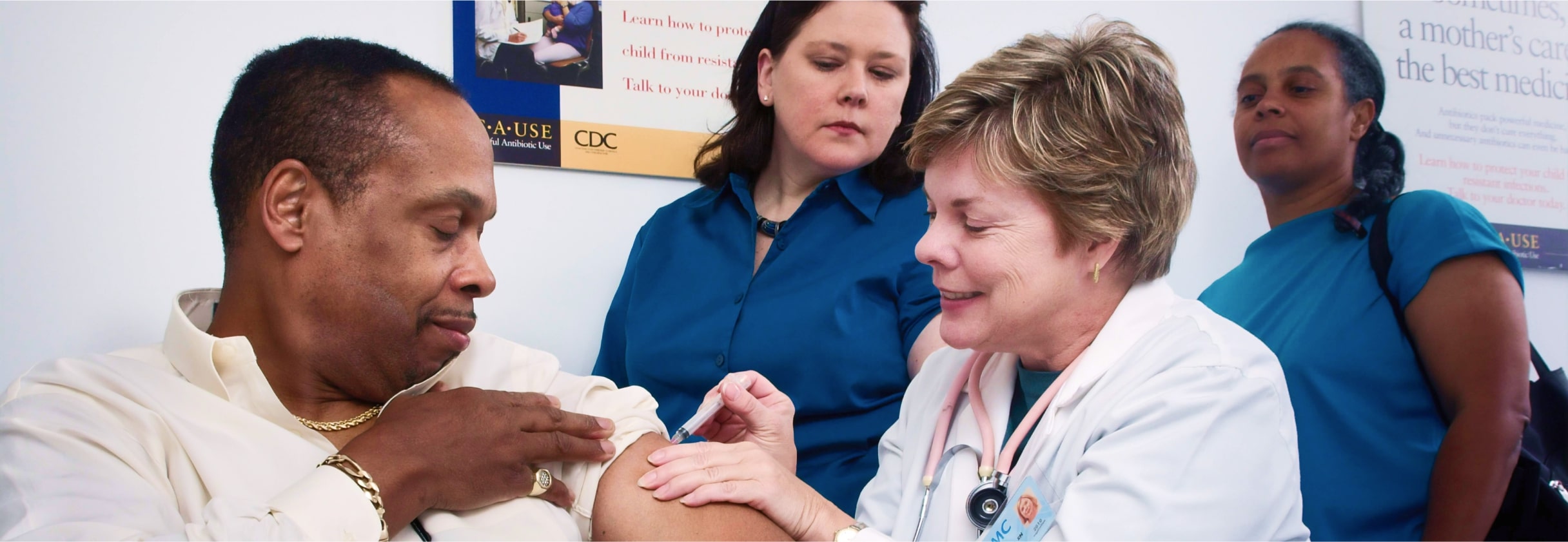 A group of people in a room.