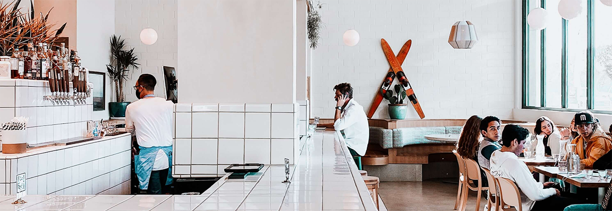 A group of people sitting at a table.