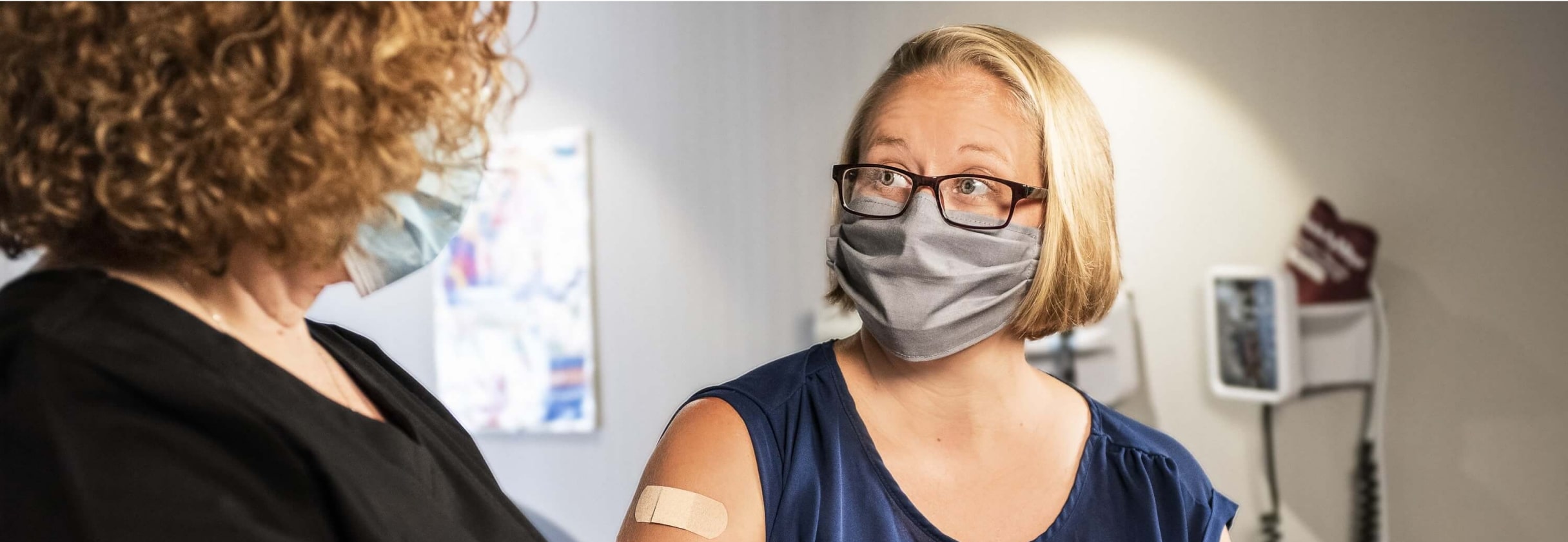 A person looking at another woman.