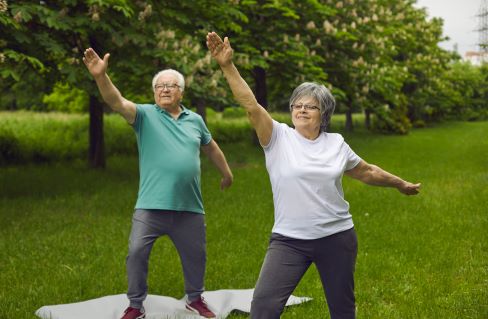 A man and woman posing for a picture.