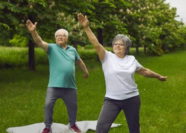 A man and woman posing for a picture.