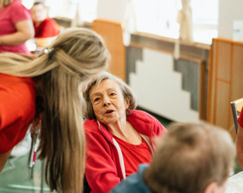 A group of people sitting in a room.