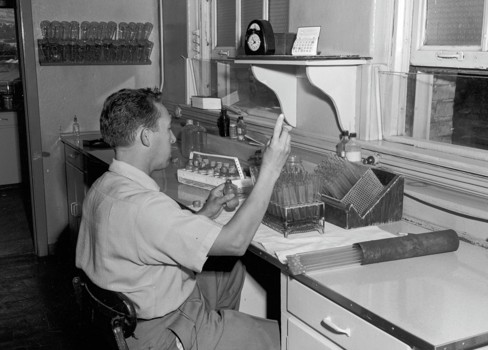A man sitting at a desk.