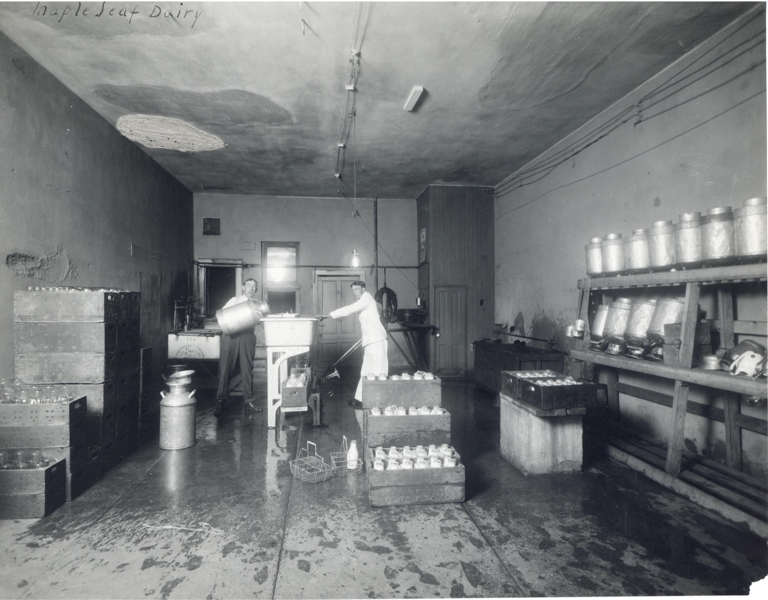 A couple of people working in a factory.