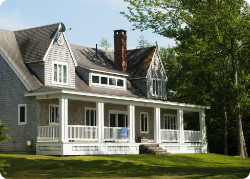 A house with a large front yard.