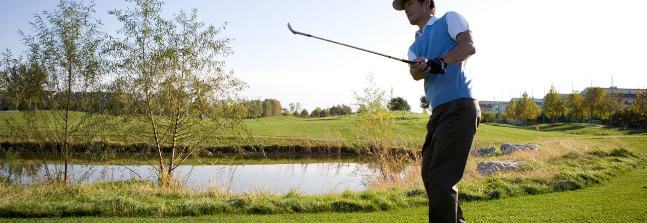 A man playing golf.