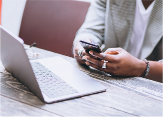 A person using a cell phone.