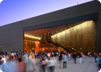 A group of people outside a building.