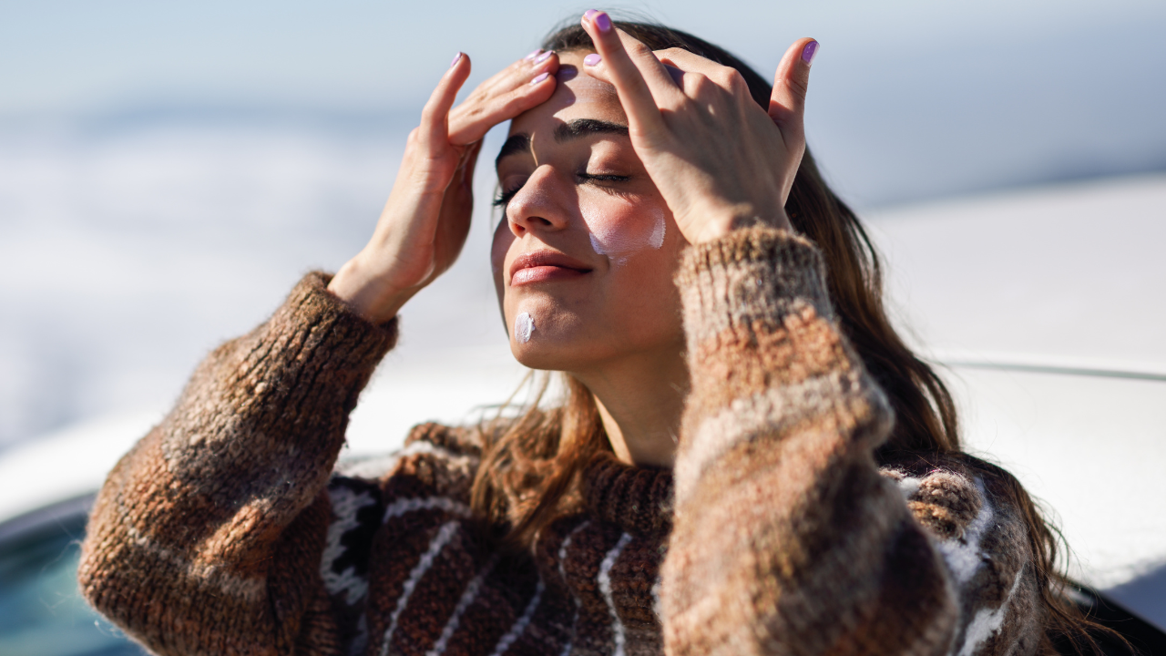 A person with the hands on the head.