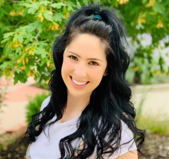 A person smiling for the camera.