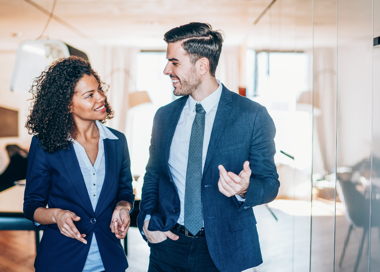 A man and a woman talking.