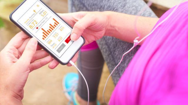 A person holding a device.