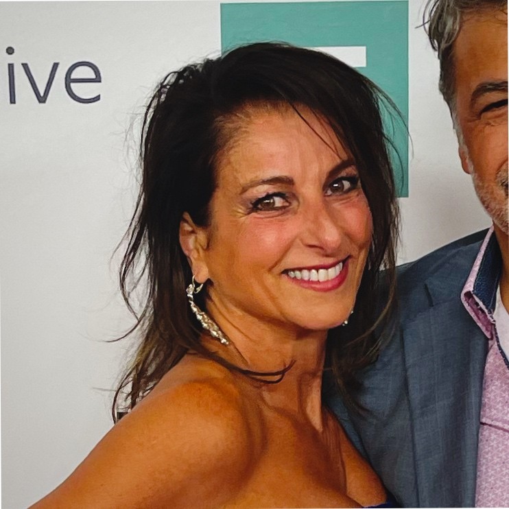 A person smiling at the camera.