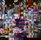 A man holding a tray of food.