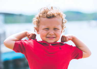 A child with her arms out.