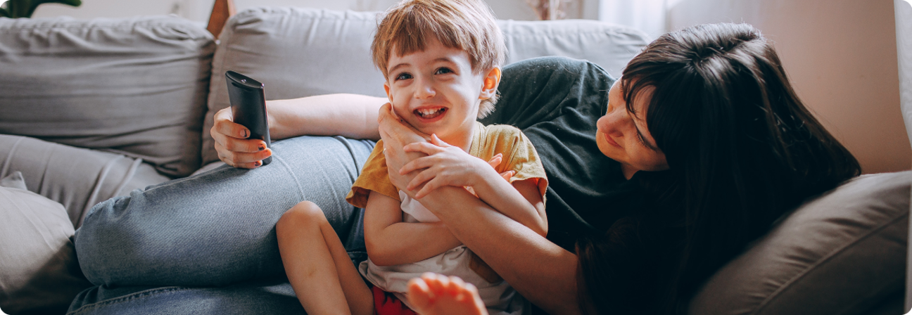 A person holding a baby.