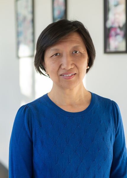 A person smiling for the camera.