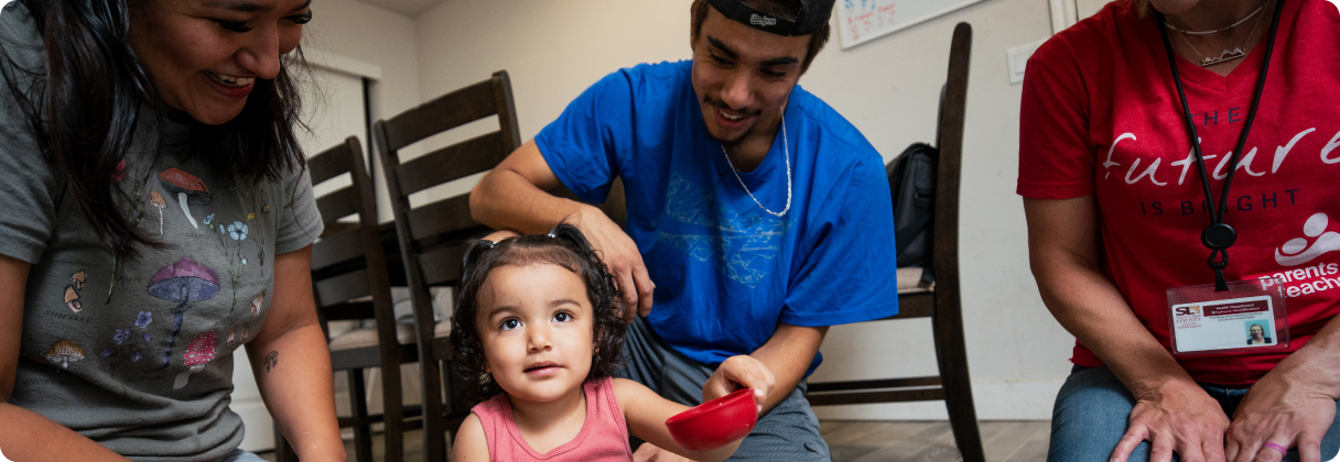 A group of people sitting in chairs.