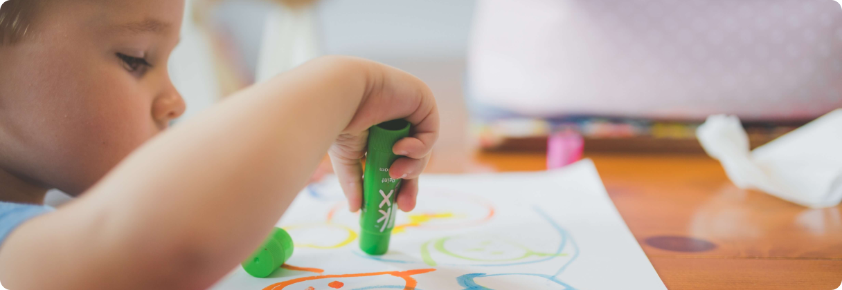 A child drawing on a paper.