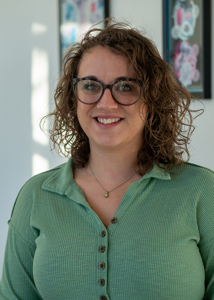 A person wearing glasses.