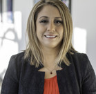 A person smiling for the camera.