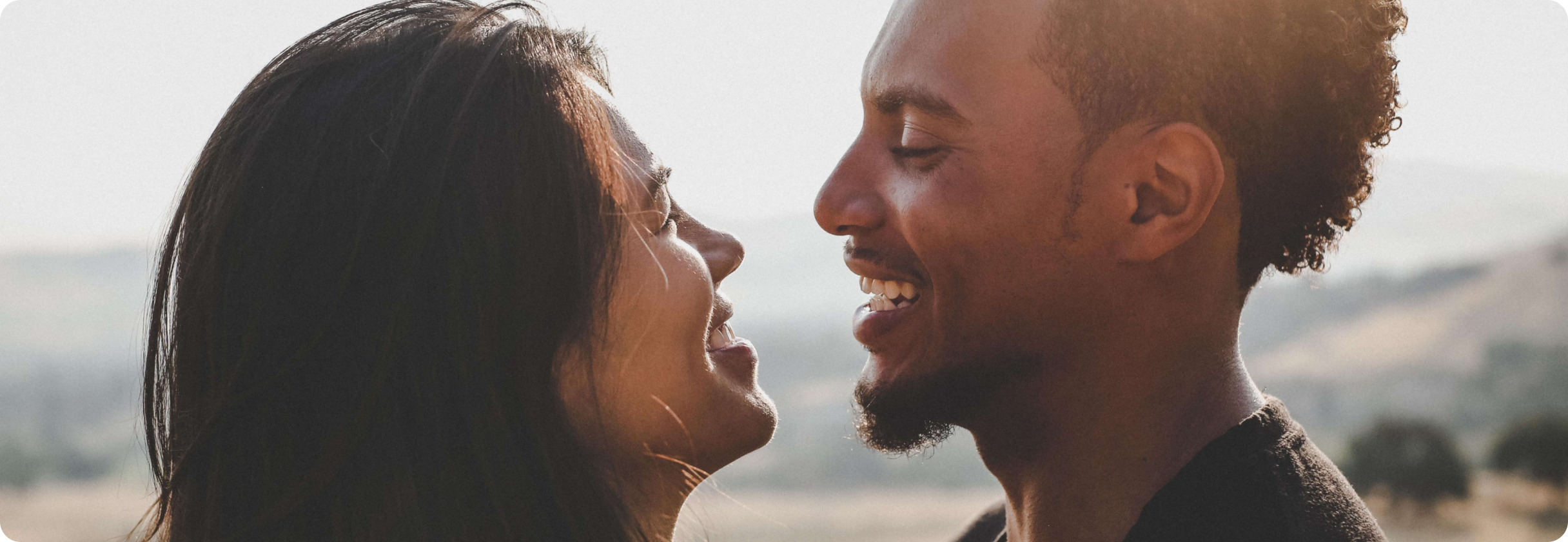 A man and woman laughing.