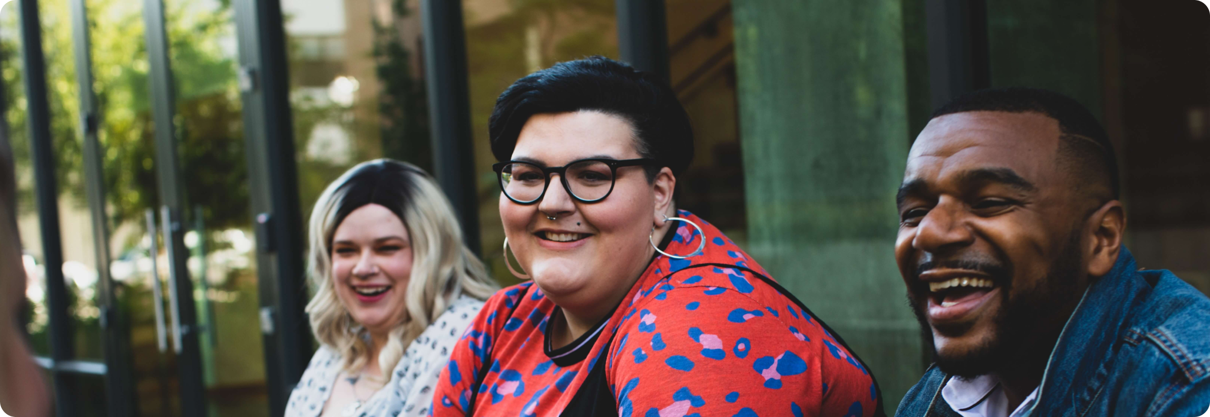 A group of people smiling.
