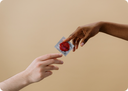 A person holding a plastic container.