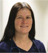 A woman smiling for the camera.