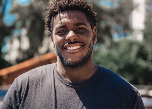 A man smiling for the camera.