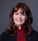 A woman with long hair.