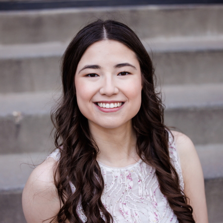 A person smiling for the camera.