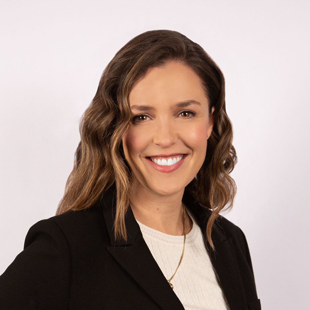 A person smiling for the camera.