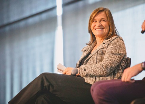 Jenny Wilson sitting on a couch.