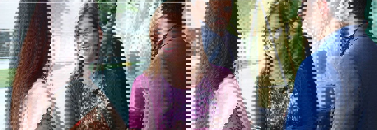 Jenny Wilson smiling at a man.