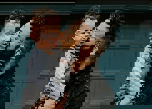 A man holding a child.